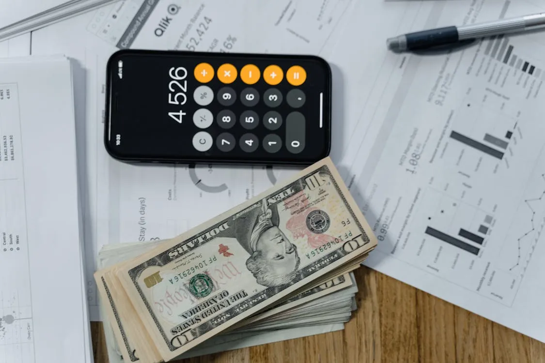 Calculator and tax filing printout for Davao freelancer 1701Q and 2551Q quarterly returns